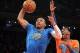 Dec 25, 2013; New York, NY, USA; Oklahoma City Thunder point guard Russell Westbrook (0) drives past New York Knicks shooting guard Iman Shumpert (21) during the first quarter of a game at Madison Square Garden. Mandatory Credit: Brad Penner-USA TODAY Spo