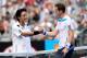 MELBOURNE, AUSTRALIA - JANUARY 14: Andy Murray of Great Britain shakes hands with Go Soeda of Japan after Murray won their first round match during day two of the 2014 Australian Open at Melbourne Park on January 14, 2014 in Melbourne, Australia. (Photo