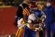 Nov 23, 2013; Ames, IA, USA; Iowa State Cyclones defender Jeremiah George (52) tackles Kansas Jayhawks running back Connor Embree (34) in the fourth quarter at Jack Trice Stadium. Iowa State won 34-0. Mandatory Credit: Bruce Thorson-USA TODAY Sports