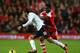 SOUTHAMPTON, ENGLAND - OCTOBER 26: Victor Wanyama of Southampton tackles Bryan Ruiz of Fulham during the Barclays Premier League match between Southampton and Fulham at St Mary's Stadium on October 26, 2013 in Southampton, England. (Photo by Julian Fin