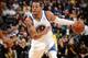 OAKLAND, CA - JANUARY 10: Andre Iguodala #9 of the Golden State Warriors drives towards the hoop against the Boston Celtics on January 10, 2014 at Oracle Arena in Oakland, California. NOTE TO USER: User expressly acknowledges and agrees that, by downloadi