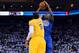 OAKLAND, CA - DECEMBER 25: Jamal Crawford #11 of the Los Angeles Clippers shoots over Andre Iguodala #9 of the Golden State Warriors during the first quarter at ORACLE Arena on December 25, 2013 in Oakland, California. NOTE TO USER: User expressly acknow