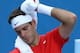 MELBOURNE, AUSTRALIA - JANUARY 14: Juan Martn Del Potro of Argentina feels the heat in his first round match against Rhyne Williams of the United States during day two of the 2014 Australian Open at Melbourne Park on January 14, 2014 in Melbourne, Austra