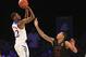 Nov 30, 2013; Paradise Island, BAHAMAS; Kansas Jayhawks guard Andrew Wiggins (22) shoots over UTEP Miners guard McKenzie Moore (13) during the first half at the 2013 Battle 4 Atlantis in the Imperial Arena at the Atlantis Resort. Mandatory Credit: Kevin