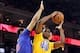 Dec 25, 2013; Oakland, CA, USA; Golden State Warriors small forward Harrison Barnes (40) shoots the ball against Los Angeles Clippers center Ryan Hollins (15) during the third quarter at Oracle Arena. Mandatory Credit: Kelley L Cox-USA TODAY Sports