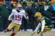 GREEN BAY, WI - JANUARY 05: Michael Crabtree #15 of the San Fransico 49ers moves around Morgan Burnett #42 of the Green Bay Packers during an NFC Wild Card Playoff game at Lambeau Field on January 5, 2014 in Green Bay, Wisconsin. The 49ers defeated the P