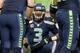 SEATTLE, WA - JANUARY 11: Quarterback Russell Wilson #3 of the Seattle Seahawks in the huddle in the second half while taking on the New Orleans Saints during the NFC Divisional Playoff Game at CenturyLink Field on January 11, 2014 in Seattle, Washington