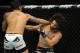 June 8, 2012; Sunrise, FL, USA; Erick SIlva (left) hits Charlie Brenneman during their UFC bout at BankAtlantic Center. Mandatory Credit: Steve Mitchell-USA TODAY Sports