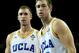LOS ANGELES, CA - NOVEMBER 28: Twin brothers David Wear #12 and Travis Wear #24 of the UCLA Bruins stand on the floor in the game with the Cal State Northridge Matadors at Pauley Pavilion on November 28, 2012 in Los Angeles, California. UCLA won 82-56.