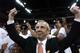 24 Mar 2002:Head coach Roy Williams of Kansas celebrates as his players cut down the net after they beat Oregon during the NCAA Mens Basketball Tournament at the Kohl Center in Madison, Wisconsin. The Kansas Jayhawks beat the Oregon Ducks 104-86 to advanc