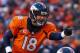 DENVER, CO - JANUARY 12: Peyton Manning #18 of the Denver Broncos calls a play during the AFC Divisional Playoff Game against the San Diego Chargers at Sports Authority Field at Mile High on January 12, 2014 in Denver, Colorado. (Photo by Doug Pensinge