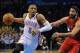 Dec 22, 2013; Oklahoma City, OK, USA; Oklahoma City Thunder point guard Russell Westbrook (0) handles the ball against Toronto Raptors point guard Greivis Vasquez (21) during the third quarter at Chesapeake Energy Arena. Mandatory Credit: Mark D. Smith-US