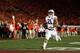 PASADENA, CA - JANUARY 06: Running back Tre Mason #21 of the Auburn Tigers runs for 37-yard touchdown against the Florida State Seminoles in the fourth quarter to take a 31-27 lead in the 2014 Vizio BCS National Championship Game at the Rose Bowl on Janu