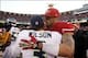 Dec 8, 2013; San Francisco, CA, USA; San Francisco 49ers quarterback Colin Kaepernick (7) talks with Seattle Seahawks quarterback Russell Wilson (3) after the game at Candlestick Park. The 49ers defeated the Seahawks 19-17. Mandatory Credit: Cary Edmondso
