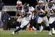 Nov 24, 2013; Foxborough, MA, USA; Denver Broncos running back Knowshon Moreno (27) runs against New England Patriots during overtime at Gillette Stadium. The Patriots defeated the Broncos 34-31. Mandatory Credit: Stew Milne-USA TODAY Sports