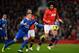 MANCHESTER, ENGLAND - DECEMBER 04: Marouane Fellaini of Manchester United competes with Ross Barkley of Everton during the Barclays Premier League match between Manchester United and Everton at Old Trafford on December 4, 2013 in Manchester, England. (P
