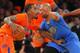 NEW YORK, NY - DECEMBER 25: J.R. Smith #8 of the New York Knicks is guarded by Derek Fisher #6 of the Oklahoma City Thunder in the first half during an NBA basketball game at Madison Square Garden on December 25, 2013 in New York City. The Thunder defeate