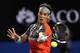 MELBOURNE, AUSTRALIA - JANUARY 14: Rafael Nadal of Spain plays a forehand in his first round match against Bernard Tomic of Australia during day two of the 2014 Australian Open at Melbourne Park on January 14, 2014 in Melbourne, Australia. (Photo by Cl