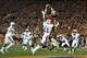 Jan 6, 2014; Pasadena, CA, USA; Florida State Seminoles wide receiver Kelvin Benjamin (1) catches a touchdown pass over Auburn Tigers cornerback Chris Davis (11) during the second half of the 2014 BCS National Championship game at the Rose Bowl. Mandator