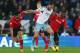 CARDIFF, WALES - JANUARY 11: Andy Carroll (C) of West Ham United battles with Kevin Theophile-Catherine and Steven Caulker (L) of Cardiff City during the Barclays Premier League match between Cardiff City and West Ham United at the Cardiff City Stadium o