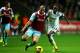 SWANSEA, WALES - OCTOBER 27: Nathan Dyer of Swansea in action against Winston Reid of West Ham during the Barclays Premier League match between Swansea City and West Ham United at Liberty Stadium on October 27, 2013 in Swansea, Wales. (Photo by Bryn Len