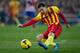 MADRID, SPAIN - JANUARY 11: Lionel Messi of FC Barcelona strikes the ball during the La Liga match between Club Atletico de Madrid and FC Barcelona at Vicente Calderon Stadium on January 11, 2014 in Madrid, Spain. (Photo by Gonzalo Arroyo Moreno/Getty I