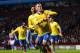 BIRMINGHAM, ENGLAND - JANUARY 13: Jack Wilshere of Arsenal ceelbrates scoring the opening goal with Serge Gnabry of Arsenal during the Barclays Premier League match between Aston Villa and Arsenal at Villa Park on January 13, 2014 in Birmingham, England.