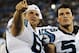 Aug 9, 2013; Charlotte, NC, USA; Carolina Panthers tackle Jordan Gross (69) talks with linebacker Luke Kuechly (59) on the sidelines against the Chicago Bears at Bank of America Stadium. Mandatory Credit: Sam Sharpe-USA TODAY Sports