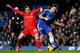 LONDON, ENGLAND - DECEMBER 29: Frank Lampard of Chelsea is tackled by Joe Allen of Liverpool during the Barclays Premier League match between Chelsea and Liverpool at Stamford Bridge on December 29, 2013 in London, England. (Photo by Julian Finney/Getty