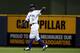 MILWAUKEE, WI - JUNE 29: Nyjer Morgan #2 of the Milwaukee Brewers signals two outs during game action against the Arizona Diamondbacks at Miller Park on June 29, 2012 in Milwaukee, Wisconsin. (Photo by Mark Hirsch/Getty Images)