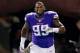 Nov 7, 2013; Minneapolis, MN, USA; Minnesota Vikings defensive tackle Sharrif Floyd (95) runs onto the field during introductions before the game with the Washington Redskins at Mall of America Field at H.H.H. Metrodome. The Vikings win 34-27. Mandatory C
