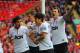 LIVERPOOL, ENGLAND - SEPTEMBER 23: Rafael Da Silva of Manchester United celebrates scoring to make it 1-0 with team mates Shinji Kagawa and Jonny Evans during the Barclays Premier League match between Liverpool and Manchester United at Anfield on Septemb