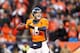 DENVER, CO - JANUARY 12: Peyton Manning #18 of the Denver Broncos looks to pass during the AFC Divisional Playoff Game against the San Diego Chargers at Sports Authority Field at Mile High on January 12, 2014 in Denver, Colorado. (Photo by Christian Pet