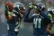 SEATTLE, WA - DECEMBER 22: Cornerback Richard Sherman #25 of the Seattle Seahawks celebrates with defensive back Byron Maxwell #41 after making an interception against the Arizona Cardinals at CenturyLink Field on December 22, 2013 in Seattle, Washington