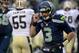 SEATTLE, WA - JANUARY 11: Quarterback Russell Wilson #3 of the Seattle Seahawks reacts in the fourth quarter while taking on the New Orleans Saints during the NFC Divisional Playoff Game at CenturyLink Field on January 11, 2014 in Seattle, Washington. (