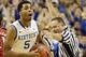 Dec 28, 2013; Lexington, KY, USA; Kentucky Wildcats guard Andrew Harrison (5) reacts to a foul during the first half against the Louisville Cardinals at Rupp Arena. Kentucky defeated Louisville 73-66. Mandatory Credit: Jamie Rhodes-USA TODAY Sports