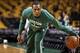 Dec 31, 2013; Boston, MA, USA; Injured Boston Celtics point guard Rajon Rondo (9) dribbles before their game against the Atlanta Hawks at TD Garden. Mandatory Credit: Winslow Townson-USA TODAY Sports
