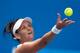 MELBOURNE, AUSTRALIA - JANUARY 15: Casey Dellacqua of Australia serves in her second round match against Kirsten Flipkens of Belgium during day three of the 2014 Australian Open at Melbourne Park on January 15, 2014 in Melbourne, Australia. (Photo by Sc