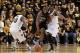 March 2, 2013; Richmond, VA USA; Butler Bulldogs forward Roosevelt Jones (21) dribbles the ball as Virginia Commonwealth Rams guard Darius Theus (10) and Rams guard Rob Brandenberg (11) defend in the first half at the Siegel Center. The Rams won 84-52. M