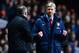 BIRMINGHAM, ENGLAND - JANUARY 13: Arsene Wenger manager of Arsenal reacts at the final whistle as he turns to Manager Paul Lambert of Aston Villa during the Barclays Premier League match between Aston Villa and Arsenal at Villa Park on January 13, 2014 i