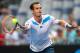 MELBOURNE, AUSTRALIA - JANUARY 14: Andy Murray of Great Britain plays a forehand in his first round match against Go Soeda of Japan during day two of the 2014 Australian Open at Melbourne Park on January 14, 2014 in Melbourne, Australia. (Photo by Camer