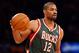Oct 30, 2013; New York, NY, USA; Milwaukee Bucks shooting guard Gary Neal (12) moves the ball during the first quarter against the New York Knicks at Madison Square Garden. Mandatory Credit: Anthony Gruppuso-USA TODAY Sports