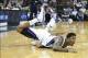 Nov 19, 2013; Sacramento, CA, USA; Sacramento Kings shooting guard Ben McLemore (16) falls to the floor after being fouled on a three point shot against the Phoenix Suns during the third quarter at Sleep Train Arena. The Sacramento Kings defeated the Phoe