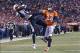 Jan 12, 2014; Denver, CO, USA; San Diego Chargers receiver Keenan Allen (13) catches a touchdown pass in the third quarter against Denver Broncos cornerback Quentin Jammer (23) during the 2013 AFC divisional playoff football game at Sports Authority Field