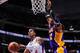 LOS ANGELES, CA - JANUARY 4: Chris Paul #3 of the Los Angeles Clippers drives to the basket against Dwight Howard #12 of the Los Angeles Lakers at Staples Center on January 4, 2013 in Los Angeles, California. NOTE TO USER: User expressly acknowledges and