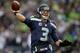 SEATTLE, WA - JANUARY 11: Quarterback Russell Wilson #3 of the Seattle Seahawks throws the ball in the second half while taking on the New Orleans Saints during the NFC Divisional Playoff Game at CenturyLink Field on January 11, 2014 in Seattle, Washingt
