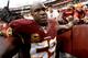 LANDOVER, MD - DECEMBER 22: London Fletcher #59 of the Washington Redskins walks off the field after the Dallas Cowboys defeated the Redskins 24-23 during an NFL game at FedExField on December 22, 2013 in Landover, Maryland. (Photo by Patrick McDermott/