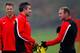 MANCHESTER, ENGLAND - OCTOBER 01: Wayne Rooney (R) and Robin van Persie of Manchester United talk during a training session ahead of their Champions League Group A match against Shakhtar Donetsk at their Carrington Training Complex on October 01, 2013 in