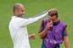 PRAGUE, CZECH REPUBLIC - AUGUST 29: Pep Guardiola the FC Bayern Munchen coach shares a joke with player Mario Gotze during a training session prior to the UEFA Super Cup match between FC Bayern Munchen and Chelsea at Stadion Eden on August 29, 2013 in Pr
