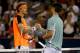 MONTREAL, QC - AUGUST 08: Denis Istomin of Uzebekistan congratulates Novak Djokovic of Serbia after their match during the Rogers Cup at Uniprix Stadium on August 8, 2013 in Montreal, Quebec, Canada. (Photo by Matthew Stockman/Getty Images)